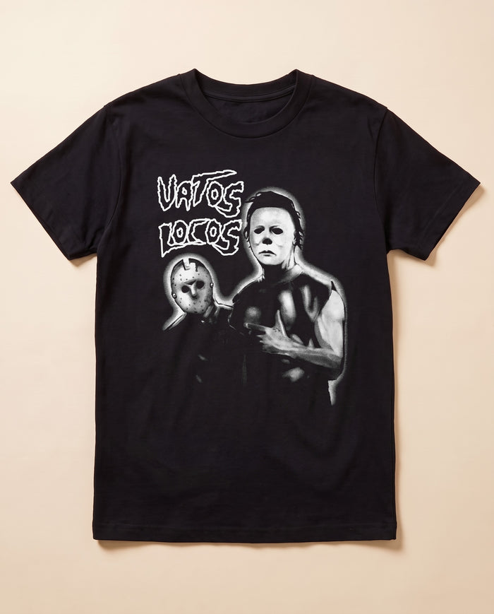 Noche de Máscaras black tee — flat lay