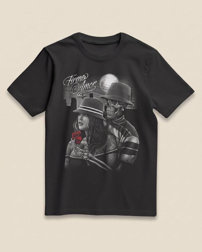 Firme Amor black tee, front view on bone background.
